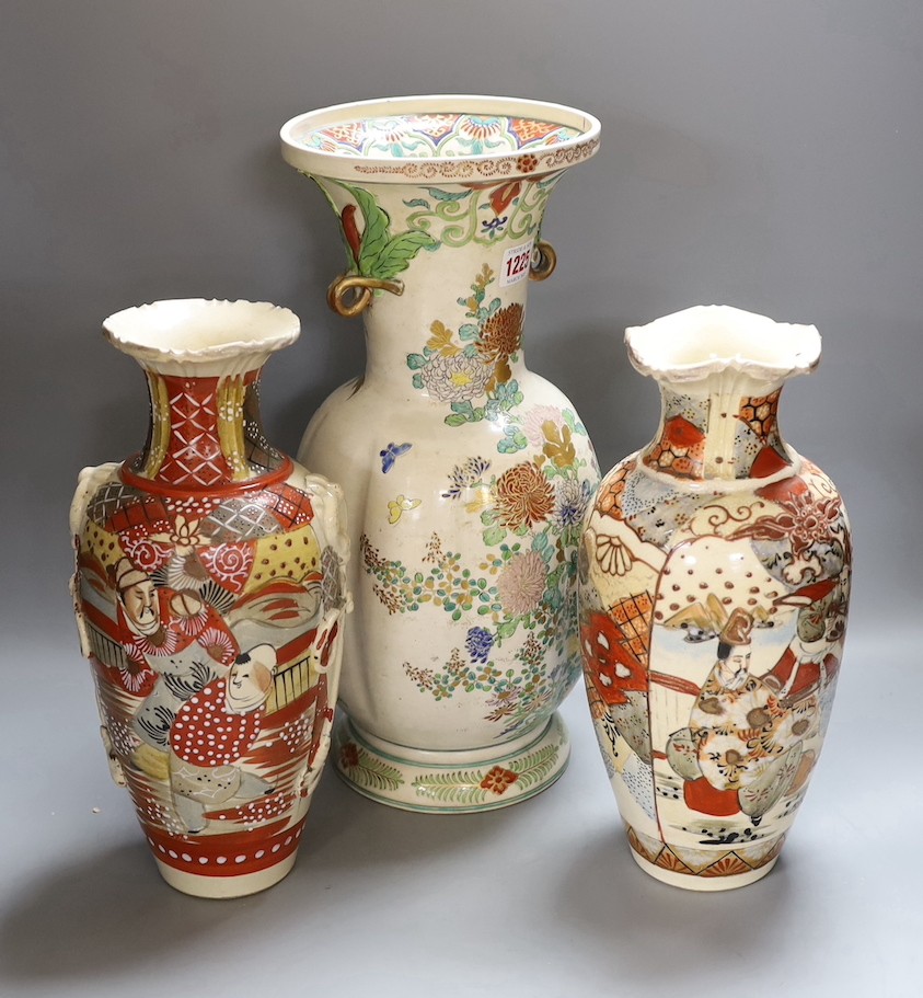 Two Japanese Satsuma vases, 30cm high, together with another (3)